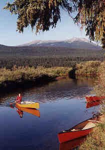 solo paddler at Bowron River Campsite